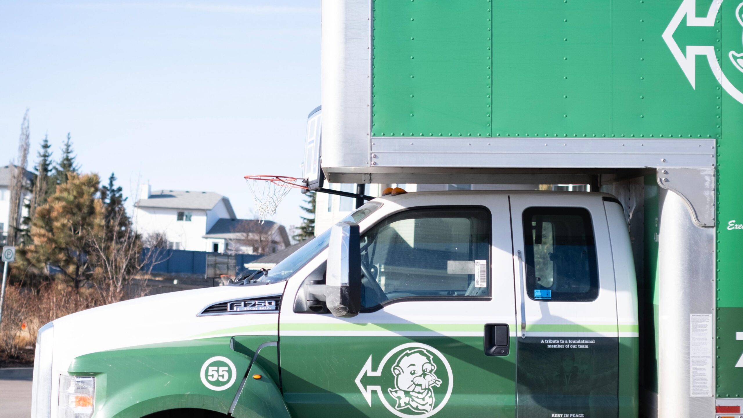 Eager Beaver movers carrying boxes during a residential move